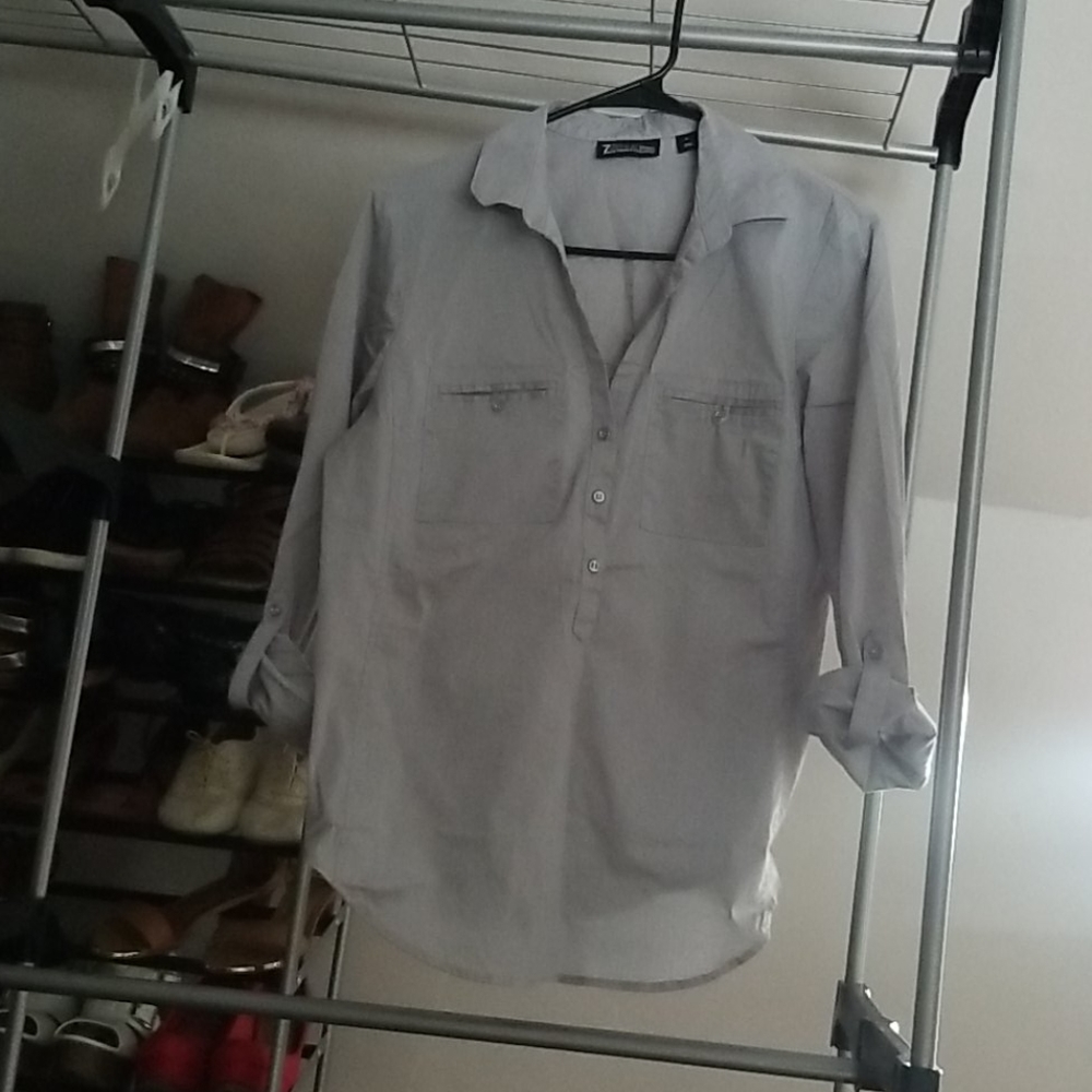 3/4 button up. Cuffed sleeved